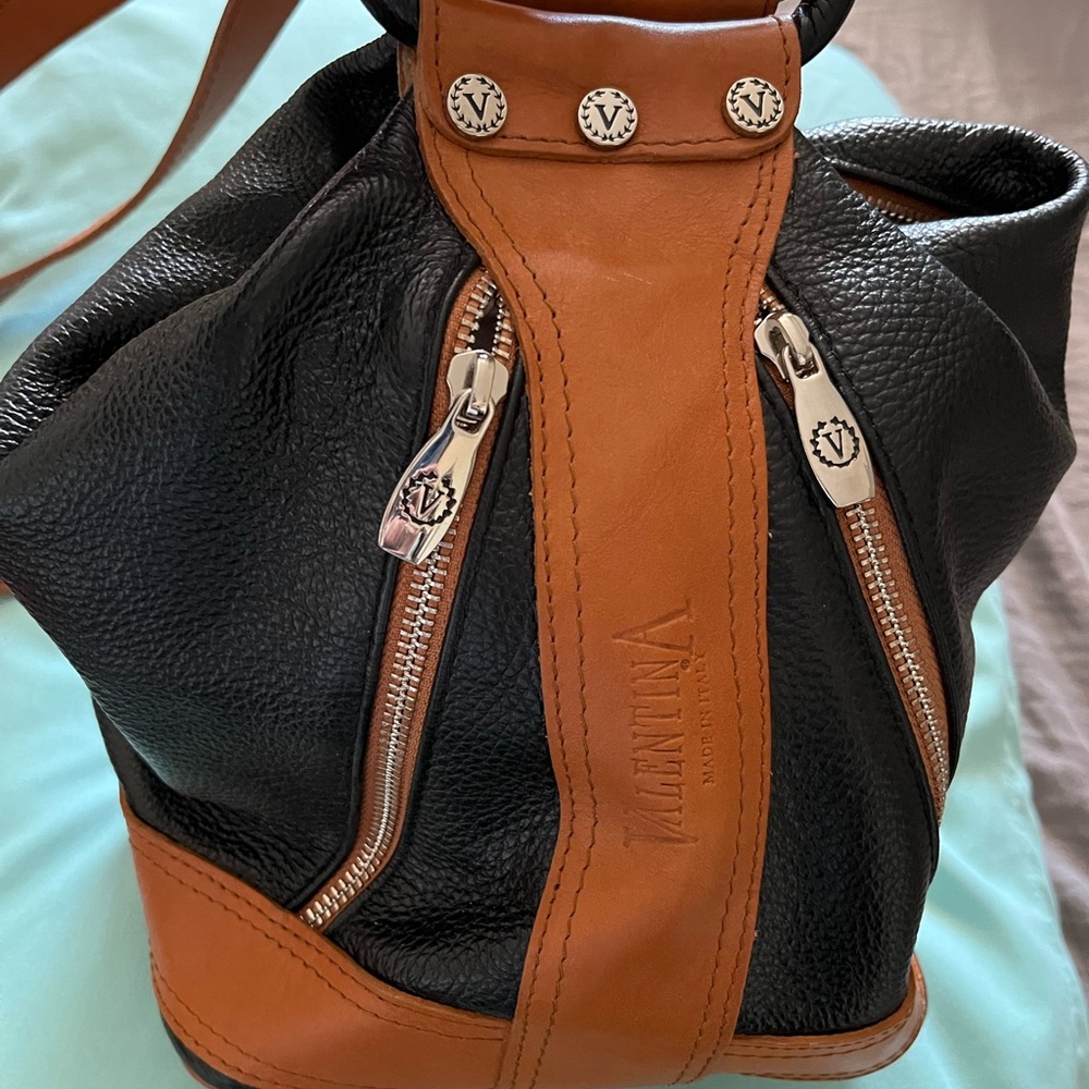 Great little bag! Like new black and brown